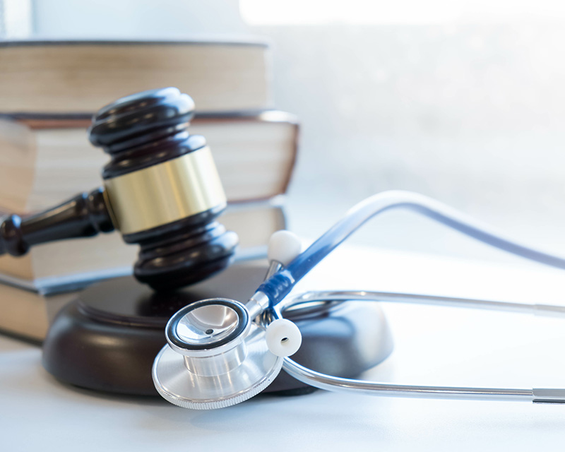 Gavel and stethoscope. medical jurisprudence. legal definition of medical malpractice. attorney. common errors doctors, nurses and hospitals make.